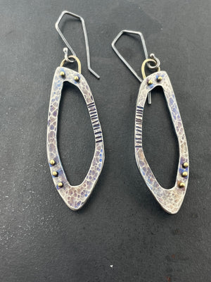 Open Progression earrings with golden accents