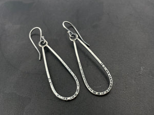 Droplets with hammered texture